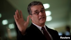 Roberto Azevedo, Director-General of the World Trade Organization (WTO), gestures during a news conference in Brasilia, Brazil, March 12, 2018. 