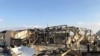Tentara AS memeriksa lokasi di pangkalan udara Ain al-Asad di provinsi Anbar, Irak, yang dihantam rudal Iran, 13 Januari 2020. (REUTERS/John Davison)