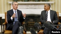 U.S. President Barack Obama meets with NATO Secretary-General Jens Stoltenberg in the Oval Office of the White House in Washington, May 26, 2015. 