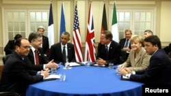 U.S. President Barack Obama joins in a meeting on the situation in Ukraine at the NATO Summit at the Celtic Manor Resort in Newport, Wales, Sept. 4, 2014. 