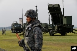 Japanese Air Self-Defense Force (JASDF) demonstrates the training to utilize the PAC-3 surface to air interceptors at the U.S. Yokota Air Base in Fussa, on the outskirts of Tokyo, Aug. 29, 2017. The pre-planned training took place the same morning North Korea fired a missile over Japan.