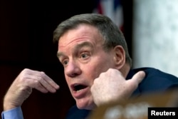 Senate Intelligence Committee Vice Chairman Mark Warner, D-Va., speaks during the Senate Intelligence Committee hearing on Capitol Hill in Washington, Jan. 29, 2019.