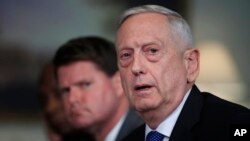 Defense Secretary Jim Mattis responds to a reporter's question during a meeting with and Philippine Secretary of National Defense Delfin Lorenzana at the Pentagon, Sept. 18, 2018. 