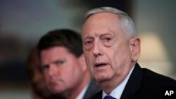 Defense Secretary Jim Mattis responds to a reporter's question during a meeting with and Philippine Secretary of National Defense Delfin Lorenzana at the Pentagon, Sept. 18, 2018.