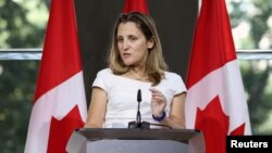 FILE - Canadian Foreign Minister Chrystia Freeland takes part in a news conference at the Embassy of Canada in Washington, Aug. 31, 2018. 