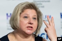 FILE - Viktoria Skripal, niece of Sergei Skripal, speaks during a news conference in Moscow, Russia, Sept. 6, 2018.