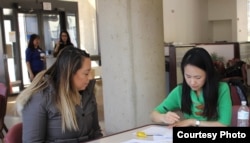 FILE - Green card holders attend a citizenship clinic in Rockville, Maryland. (Photo courtesy of AAJC)