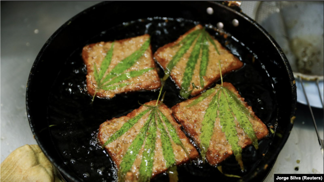 Pork sandwiches with marijuana leafs at Abhaibhubejhr hospital canteen which adds cannabis infused dishes to its menu after cannabis leaves, steams, stalks and roots were officially removed from Thailand's narcotics list, allowing basically any part of the plant except for the buds to be used for consumption in Prachin Buri province, outside Bangkok, Thailand January 15, 2021. REUTERS/Jorge Silva