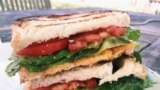 Pictured here is a grilled cheese sandwich with lettuce and tomato. For a sandwich, you need slices of bread that are the same size. (File Photo)