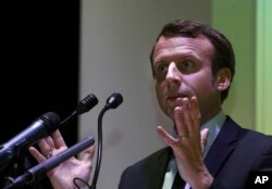 French presidential candidate and former French Economy Minister Emmanuel Macron, speaks during a conference at the Ecole Superieure des Affaires (ESA Business School) in Beirut, Lebanon, Jan. 23, 2017.
