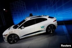 A Jaguar I-PACE self-driving car is pictured during its unveiling by Waymo in the Manhattan borough of New York City, March 27, 2018.