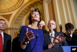 FILE - Senate Energy and Natural Resources Committee Chair Sen. Lisa Murkowski, R-Alaska, voices her opposition after President Barack Obama waded into a decades-long fight over drilling in Alaska's Arctic National Wildlife Refuge, in Washington, Jan. 27, 2015.