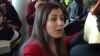 Vahideh Rasekhi, an Iranian doctoral student at Stony Brook University, greets friends and family as she is released from detention at John F. Kennedy International Airport in New York, Jan. 29, 2017.