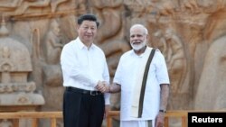 တရုတ်သမ္မတနဲ့ အိန္ဒိယဝန်ကြီးချုပ် တွေ့ဆုံ
