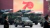 资料照片：在北京天安门广场为庆祝中共建政70年举行的阅兵式上展示的中国车载东风17型弹道导弹。(2019年10月1日)