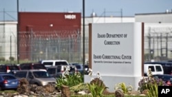 FILE - The Idaho Correctional Center south of Boise, Idaho, is operated by Corrections Corporation of America and is pictured in this June 15, 2010, photo. The Justice Department says it’s phasing out its relationships with private prisons.