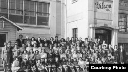 This 1944 wartime staff portrait, taken at the Gibson guitar factory in Michigan, piqued author John Thomas' curiosity about the women's role in making the iconic instruments. (Courtesy of John Thomas)