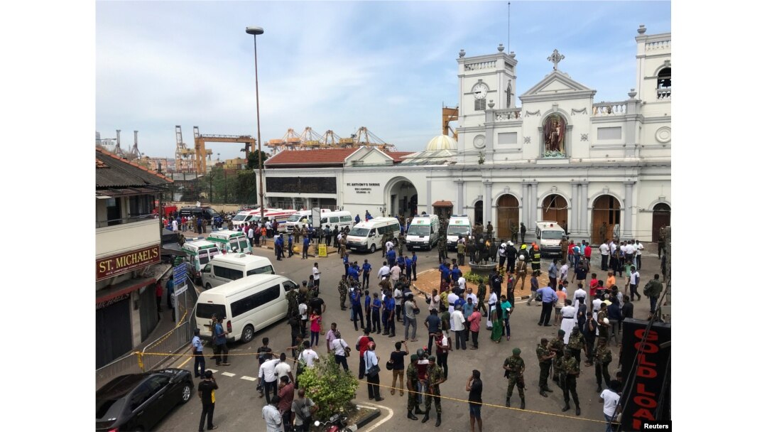 Sri Lankan military officials stand guard in front of the St. Anthony's Shrine, Kochchikade church after an explosion in Colombo, Sri Lanka, April 21, 2019.