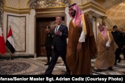 U.S. Secretary of Defense Ash Carter walks with Saudi Arabia's Deputy Crown Prince and Minister of Defense Mohammed bin Salman as Carter arrives for the Gulf Cooperation Council Defense Ministerial in Riyadh, Saudi Arabia, April 20, 2016.