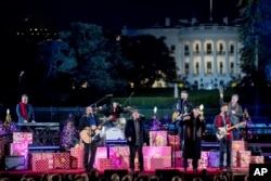 The Beach Boys perform during the lighting ceremony for the 2017 National Christmas Tree on the Ellipse near the White House, Nov. 30, 2017, in Washington.