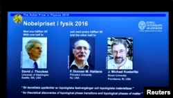 Pictures of the winners of the 2016 Nobel Prize for Physics during a news conference by the Royal Swedish Academy of Sciences in Stockholm, Sweden, Oct. 4, 2016.
