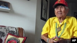 FILE - Chester Nez talking about his time as a Navajo Code Talker in World War II at his home in Albuquerque, New Mexico. 