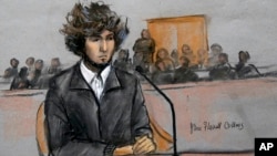 A courtroom sketch depicts Boston Marathon bombing suspect Dzhokhar Tsarnaev sitting in federal court in Boston, Massachusetts, Dec. 18, 2014, for a final hearing before his trial begins in January.