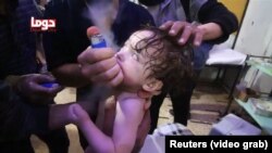 Video posted to a social media Web site shows a child being treated with an inhaler following the attack in Douma, Syria, April 7. 2018. Sources: Reuters (video grab)