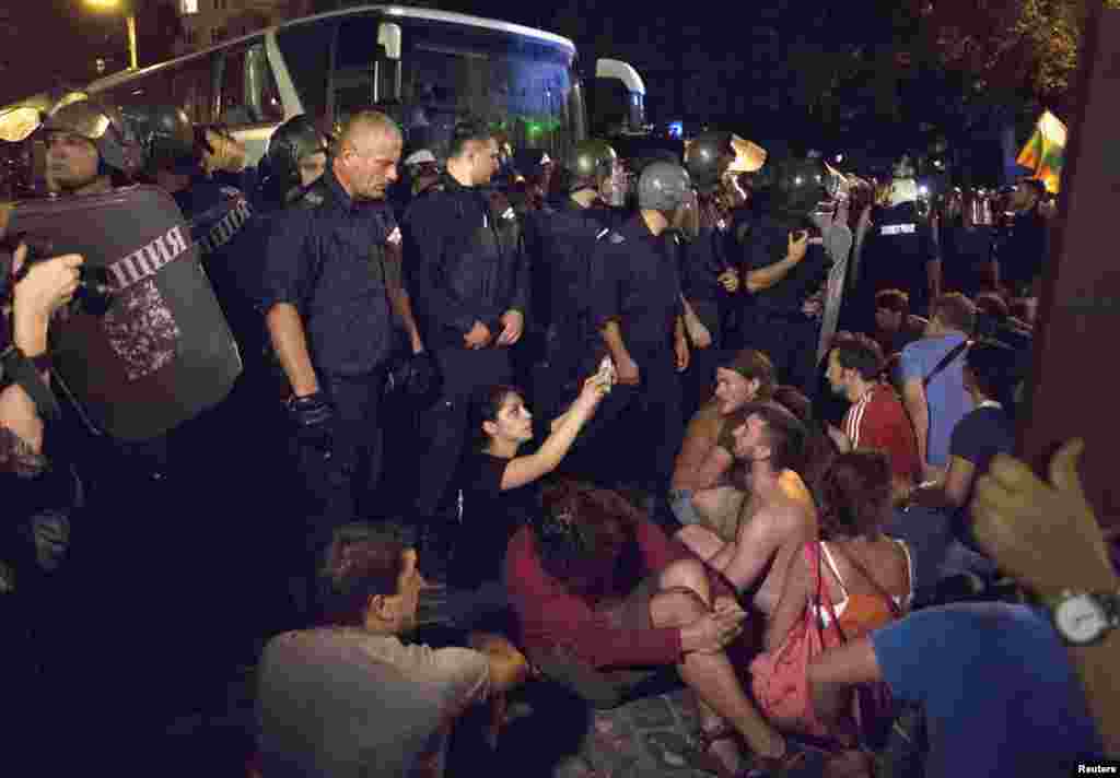 Police surround protesters outside parliament, Sofia, Bulgaria, July 23, 2013. 