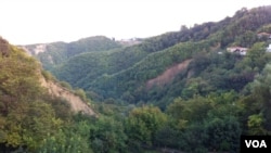 In hills and valleys like these, near Sighnaghi, archeologists have found evidence of grape cultivation and wine fermentation dating back to 7,000 BC, making eastern Georgia the site of the earliest known evidence of wine production, Georgia, October 2012