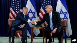 President Donald Trump shakes hands with Israeli Prime Minister Benjamin Netanyahu at the United Nations General Assembly, Sept. 26, 2018, at U.N. Headquarters.