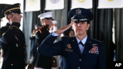 Air Force Gen. Lori Robinson, the incoming commander of NORAD and U.S. Northern Command, salutes during her arrival at the change of command ceremony, at Peterson Air Force Base, in Colorado Springs, Colo., May 13, 2016. 