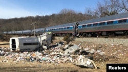 An Amtrak passenger train carrying Republican members of the U.S. Congress from Washington to a retreat in West Virginia is seen after colliding with a garbage truck in Crozet, Va., Jan. 31, 2018.