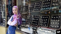 A jewelry vendor outside a store in the Khan al-Khalili area of Cairo (file photo)