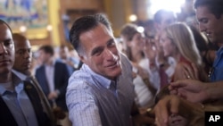 Republican presidential candidate, former Massachusetts Gov. Mitt Romney shakes hands during a campaign rally, Saturday, Sept. 1, 2012, in Cincinnati, Ohio.