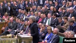 Thủ tướng Anh Theresa May phát biểu trước Nghị viện trước cuộc biểu quyết về kế hoạch Brexit của bà ở London, Anh, ngày 15 tháng 1, 2019.