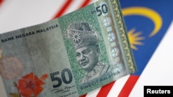 FILE - A Malaysia Ringgit note is seen in this illustration photo, June 1, 2017. 