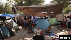 Solicitantes de asilo concentrados en una plaza pública de Reynosa, México, en la frontera con EE. UU., el 27 de agosto de 2021.