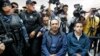 Guatemala President's Brother, Son Held on Suspicion of Fraud