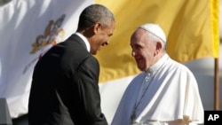 President Barack Obama shakes hands with Pope Francis after this welcoming speech during the state arrival ceremony on the South Lawn of the White House in Washington, Wednesday, Sept. 23, 2015.