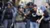Palestinians Clash With Israeli Riot Police at Holy Site