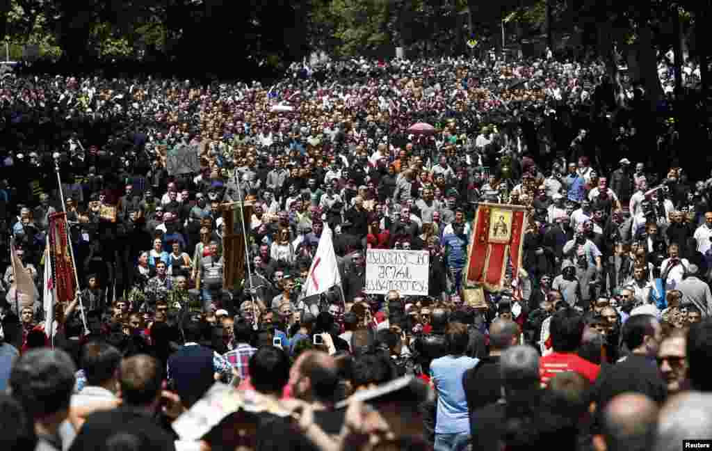 Orthodox Christian activists march before clashes with gay rights activists at an International Day Against Homophobia and Transphobia rally in Tbilisi, May 17, 2013.