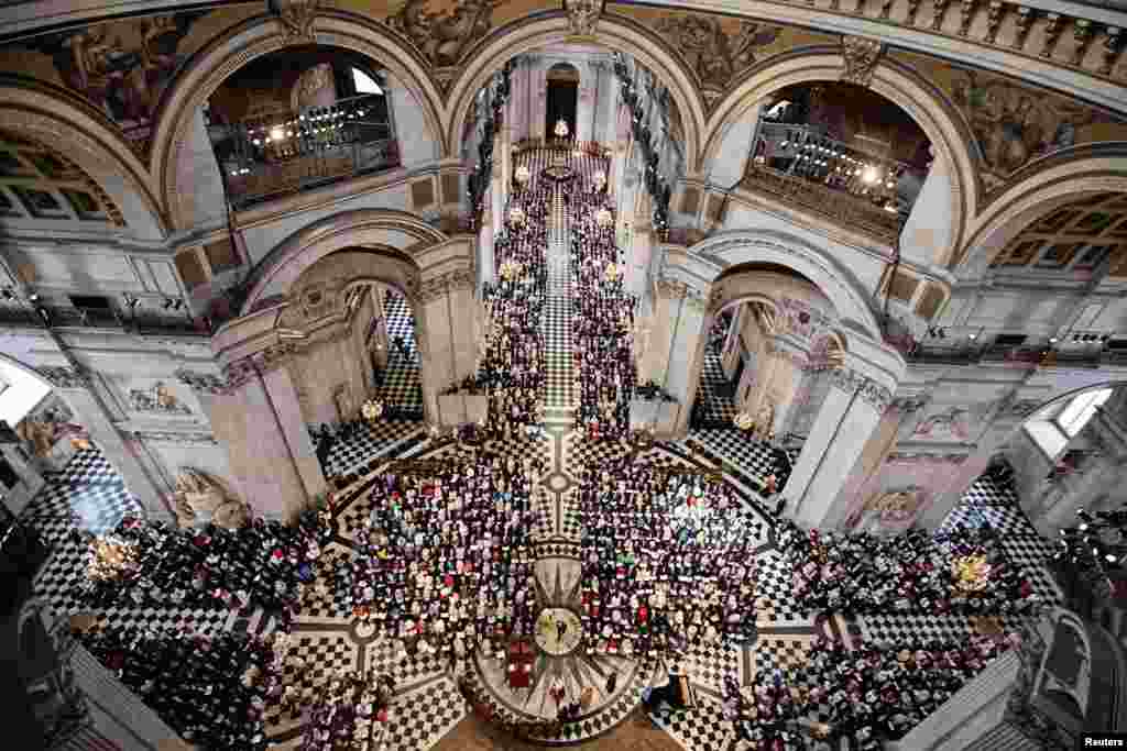 The congregation sit during a service of thanksgiving for Britain&#39;s Queen Elizabeth&#39;s 90th birthday at St Paul&#39;s Cathedral in London.