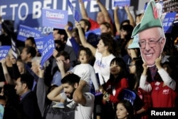 Supporters gather to see U.S. Democratic presidential candidate Bernie Sanders speak during a election night rally in Santa Monica, California, June 7, 2016.