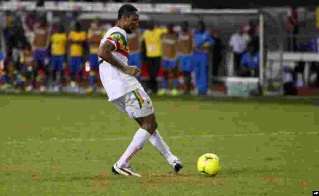 Mali's Seydou Keita takes his kick in the penalty shootout during their African Cup of Nations quarter-final soccer match against Gabon at the Stade De L'Amitie Stadium in Gabon's capital Libreville, February 5, 2012.