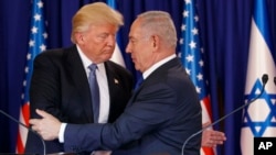 FILE - President Donald Trump shakes hands with Israeli Prime Minister Benjamin Netanyahu after making a joint statement in Jerusalem, May 22, 2017.