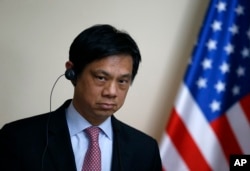Hoyt Brian Yee, Deputy Assistant Secretary for European and Eurasian Affairs, listens as Serbian Prime Minister Aleksandar Vucic speaks during a shared news conference, in Belgrade, May 24, 2017.