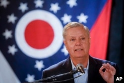 FILE - Sen. Lindsey Graham, R-S.C., speaks during a campaign event in downtown Cincinnati, Oct. 30, 2018.
