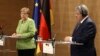 Merkel, Algerian Officials Discuss Migration, Libya