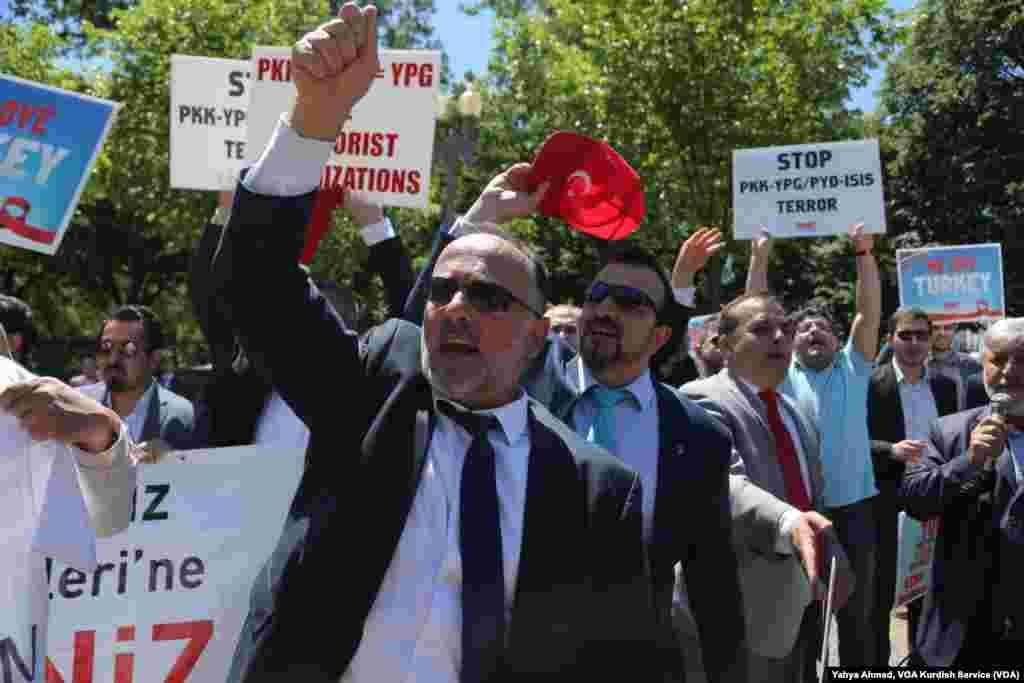 Supporters of Turkish President Recep Tayyip Erdogan react to anti-Erdogan supporters outside the White House in Washington, D.C., May 16, 2017. Erdogan was meeting with U.S. President Donald Trump Tuesday.